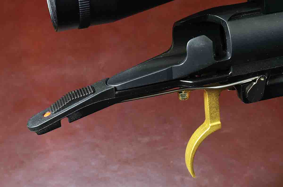 The trigger mechanism is contained in a separate housing that also incorporates the safety and tang extension.